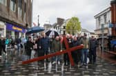 A poignant service was held at First Lisburn Presbyterian Church after the cross was carried up Bow Street