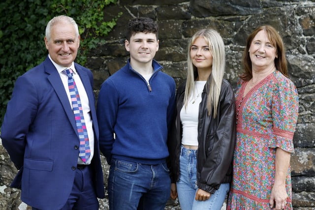 Mr Brady (Principal) and Mrs McKay (Vice-principal) with Head Boy Dara McCollam and Head Girl Lena Harvey.