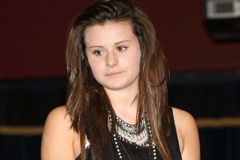 Stepping out in style, members of Ballyclare Ladies Hockey Club model fashion at a 2010 fundraiser. NT39-021FP