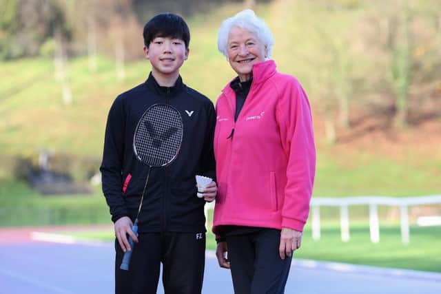 Young badminton star Jeffrey Rong pictured with Lady Mary Peters. Photo submitted by Mary Peters Trust