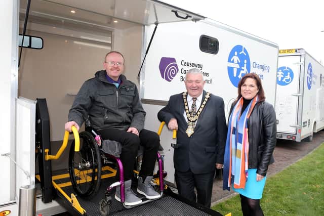 Pictured with one of Causeway Coast and Glens Borough Council’s new Mobile Accessible Changing Units are the Mayor, Councillor Ivor Wallace, Michael Holden (AccessoLoo Director) and Julienne Elliott, Town and Village Project Manager.