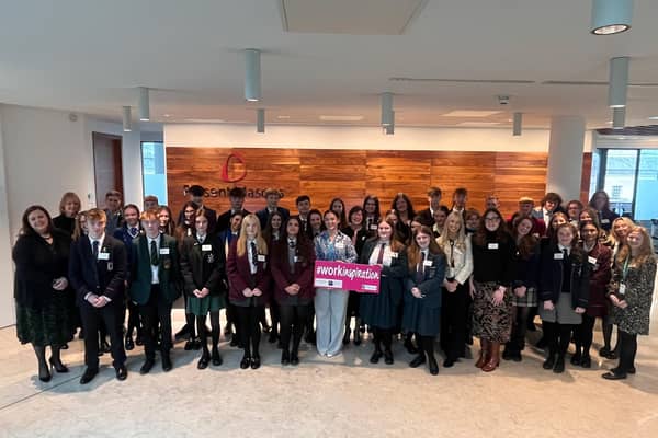 Staff from Pinsent Masons’ Belfast office and representatives from Business in the Community NI pictured with Madam Justice McBride (centre) and those AS and A Level pupils who took part in the recent Schools’ Work Inspiration Day. Pic credit: Pinsent Mason