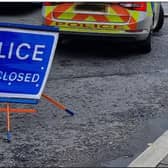 The road has been closed due to fuel spillage.
