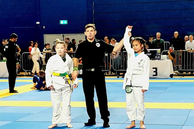 Members of Merville Ju Jitsu Club returned home with nine gold medals, three silver medals and three bronze medals.