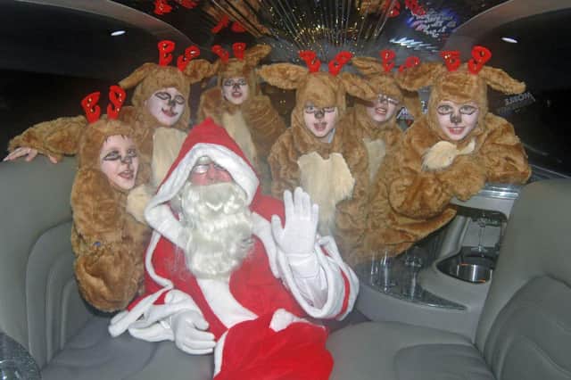 Santa and his reindeer travelled to the Larne Christmas lights switch on in the back of a limousine in 2006. LT48-335-PR