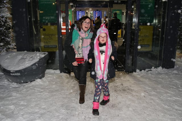 Mairead Moore with mum Evonne, from Coleraine, take their first steps out into the snow in Lapland