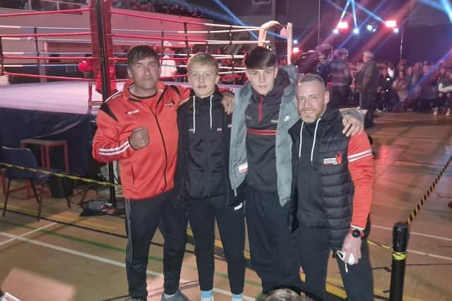 Pictured ringside at the Pontypool ABC Wales are Charlie Mulligan and Cayden Cummings from Cookstown Boxing Club with their coaches. Credit: Submitted