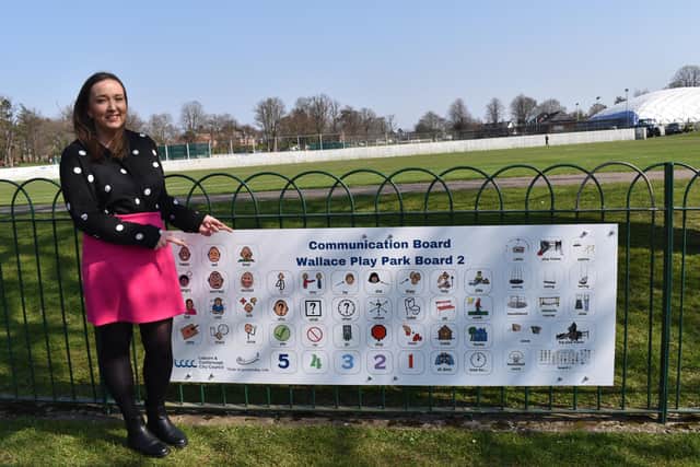 Councillor Claire Kemp welcomes the introduction of playpark communication boards by Lisburn and Castlereagh City Council. Pic credit: Alliance