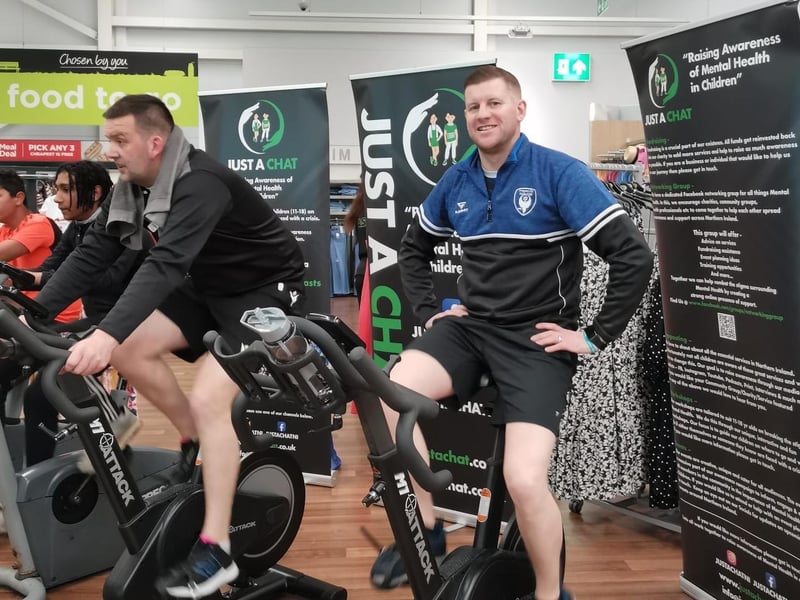 It takes focus and stamina to help cycle 282 miles - a feat achieved by a team of people including these men at Asda in Portadown. They did it to raise vital funds for a local charity Just A Chat which was set up to raise awareness and combat the stigma of mental health for youths.