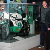 Pictured beside Joey Dunlop's bike which features in the exhibition, are from left:  Ryan Farquhar, Philip McCallen and son of Joey Dunlop, Gary Dunlop. Picture: Declan Roughan / Press Eye