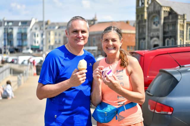 People in Portstewart on Sunday enjoying the sunny weather amid Northern Ireland's 'mini heat wave’. Photo - Andrew McCarroll/ Pacemaker Press