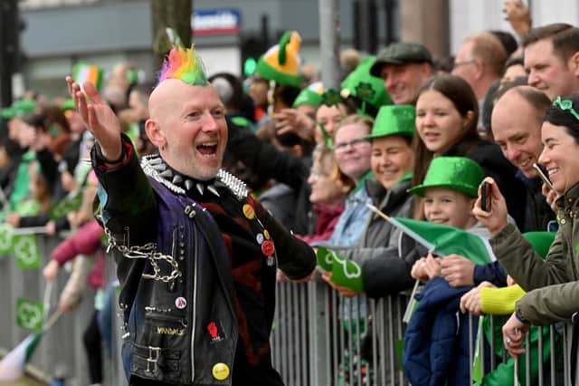 This performer brings a smile to the face of spectators along the parade route.