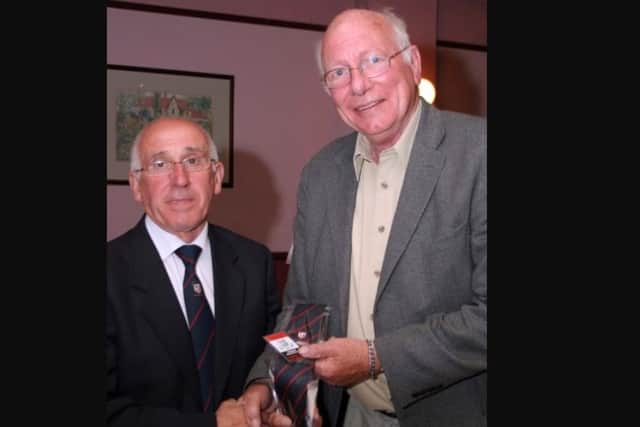 Don Horner of Ballyclare Comrades FC presenting photographer Robin McIlwaine with a life membership for his coverage of Ballyclare Comrades over the years. Photo by: Freddie Parkinson