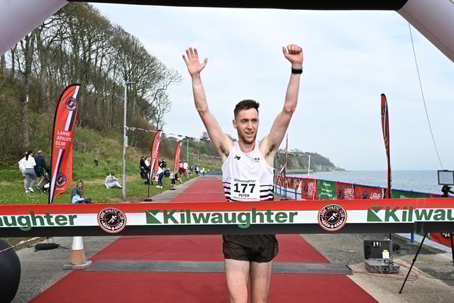 Peter Donnelly from Candour Track Club won the men’s race at the 2025 Kilwaughter Minerals Larne 10 Mile Race, which took place on Saturday, with over 700 runners taking part. Peter is pictured crossing the line in a time of 53 minutes and 56 seconds, with Jordan Herron (Larne Athletic Club) coming second and Marcel Corry (Annadale Striders) finishing third.