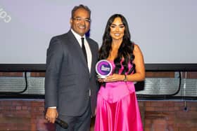 Awards host Krishnan Guru-Murthy presenting Lucy McCammond from SPAR Abbots Cross with their award for Refit of the Year at the Convenience Store Awards.  Photo: Carl Sukonik | The Vain Photography