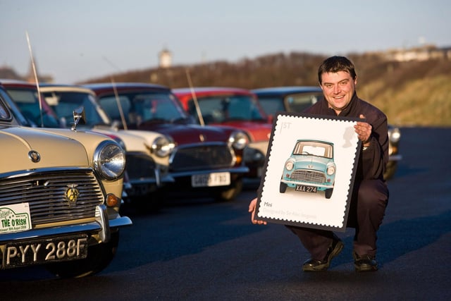 Portrush postman James from Royal Mail launches the new Mini stamp in Portrush in 2009.