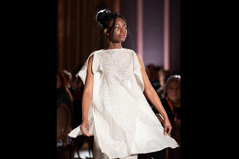 Modelling one of the designs at the charity fashion gala.