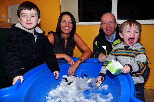 At St Aloysius’ open night in 2010 are Senan De Satis, David and Donal Wright with Primary 2 teacher Tracey McDowell