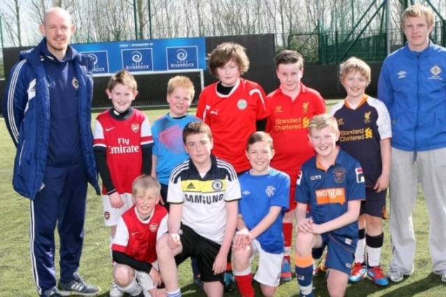 Children at the IFA Easter Soccer School with coaches Steven Livingstone and Paul Thompson in 2013.