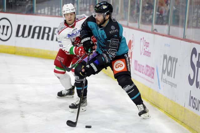 Belfast Giants’ David Gilbert with Cardiff Devils’ Ben Davies during Sunday afternoons Elite Ice Hockey League game at the SSE Arena, Belfast    Photo by William Cherry/Presseye