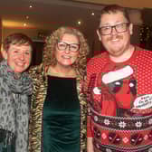 Craigavon Area Hospital Trauma Unit staff in party mood at the Seagoe Hotel Christmas Party Night. Included from left are, Amanda White, Debbie Bradley and Stephen McConaghy.   PT50-224.