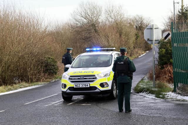 PSNI officers at the scene of a suspicious object in the Gortgonis Road in Coalisland on Friday. Picture: Press Eye