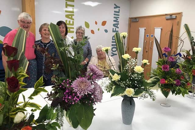​Fabulous floral displays created at the flower-arranging class.