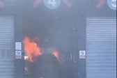 The car on fire at the Mallusk DVA test centre on January 26. (Pic: Contributed).