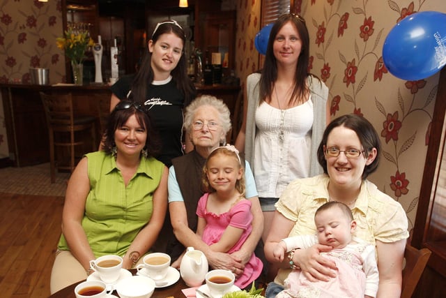 Joanne Tracey, Jemma Bacon, Gillian and Megan Cushnahan, Evelyn Bacon and Carol and Anna Maguire enjoying the Ulster Cancer Foundation Coleraine Branch coffee morning at the Railway Arms back in 2009