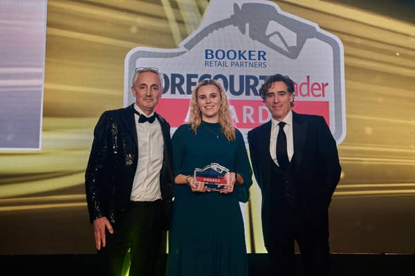 Danielle Martin from SPAR Mallusk, Newtownabbey is presented with the Forecourt Trader Award for Best Food-to-Go Outlet. Also pictured are Tony Owen (left) from sponsor Rollover, and awards host, Stephen Mangan. (Pic: Contributed).