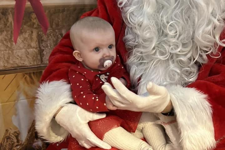 This little one enjoyed meeting Santa.