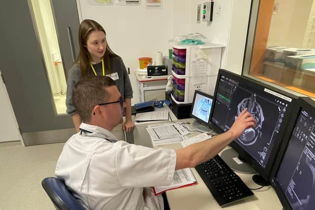 Chris Smyth demonstrating an MRI to one of the students. Pic credit: SEHSCT