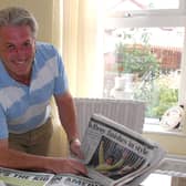 Mickey McDonald looks through the reports of his nephew Rory McIlroy at the Open Championship. LM30-132gc