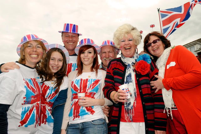 Her Majesty The Queen's Diamond Jubilee Street party in Fairmead Walk Cowplain
(left to right) Sue Barr (47), Emily Barr (14), Mark Barr (49), Rachel Barr (22), John Wadley (75), Carol Wadley (66), and Tanya Wadley (45) 
Picture: Malcolm Wells (121947-6515)