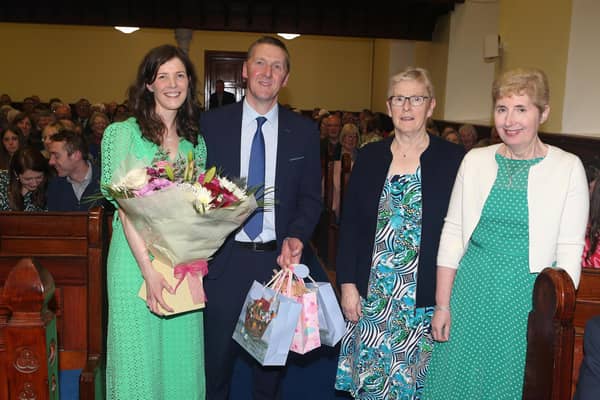 Rev. Philip McKelvey and his wife Sarah presented with gifts by Gracena Getty and  Audrey Kane at his Service of Installation for Toberkeigh and Ramoan Congregations at Toberkeigh Presbyterian church on Friday evening