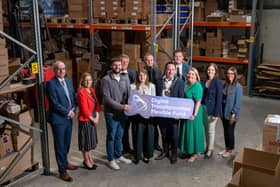 From left: Martin McKendry (Head of Food, Farming & Rural Affairs Group DAERA), Tracy McAvoy (Client Executive, Regional Business Team (Invest NI), Stephen Henderson (Owner SJ Henderson Fulfilment), Stephen Wightman (Director, City & Growth Deals (Invest NI)), Dr Caoimhe Archibald (DfE Minister), Michael Forster (FFNI Operations Lead), Councillor Pete Byrne (NMDDC Chairperson), Steven Norris (ANBC Chair of the DTFF Operations Group), Sheila Walker (Head of Rural Affairs Investment Branch), Amanda Smyth (NMDCC Assistant Director: Economy, Growth and Tourism) and Paula Jones (Project Officer (Digital Innovation and Regeneration))