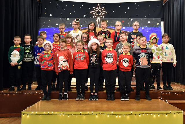 Pupils of P4S performing in the Hart Memorial Primary School Key Stage One Christmas Variety Concert.  PT50-811.