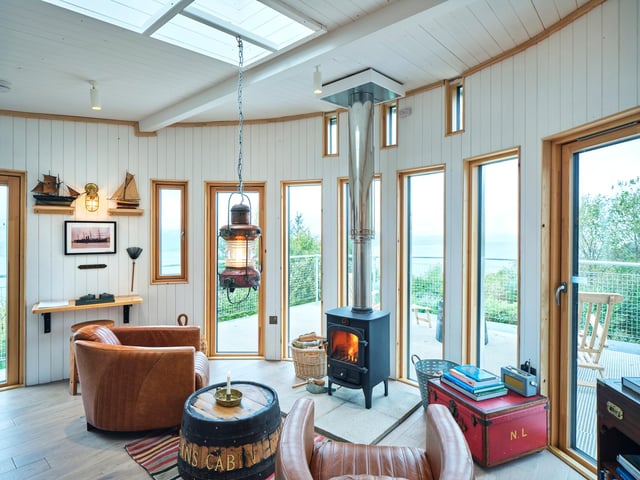 Lined with windows, there's also a huge skylight that means you can keep a keen eye on those beautiful views...in just about every direction.