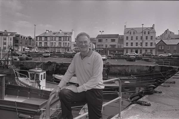 Footballing legend Harry Gregg whose life will be showcased in an upcoming exhibition in Coleraine Town Hall called “Harry Gregg: Dare to Dream.” Pictured standing at Portstewart Harbour. CREDIT CAUSEWAY COAST MUSEUM SERVICES