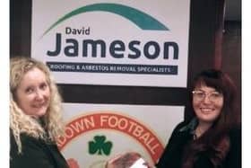 Carrie Simpson receiving the overall winners trophy from Jane Dixon, Corporate and Partnerships Manager for Southern Area Hospice Services.