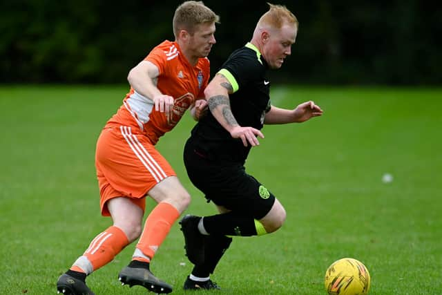 Cathal O'Reilly gets away from Damolly's Andrew Boyce in the Mid-Ulster Shield at Derrylecka on Saturday Pictures: Brendan Monaghan. RS2341408