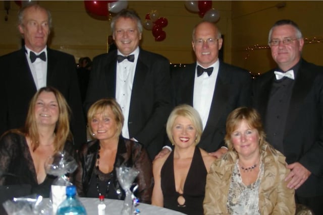 Formal attire was the order of the evening for this group at the 2006 charity dance in Whitehead Community Centre.