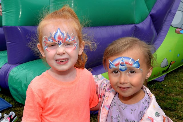 Carly Millington (4) and Poppy McClune (3) showing off their painted faces at the Edgarstown July 11 fun day on Tuesday afternoon. PT27-283