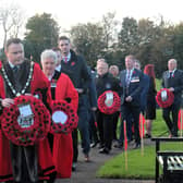 Mayor of Antrim and Newtownabbey, Cllr Mark Cooper, laid the first wreath at the Row on Row memorial.