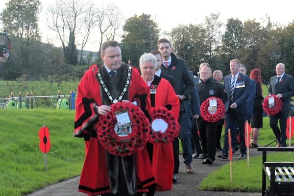 Mayor of Antrim and Newtownabbey, Cllr Mark Cooper, laid the first wreath at the Row on Row memorial.