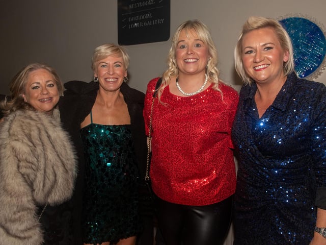 A group of close friends from Annaghmore ready for a Christmas party night. PT50-268.