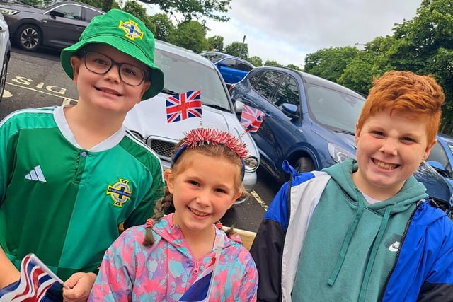 Beaming faces during Twelfth of July festivities in Lisburn