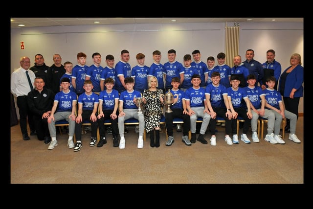 Deputy Lord Mayor, Councillor Sorcha McGeown, with members of the Clan Na Gael, Under 18 team who won the County Division One Championship and Under 16 team members who won the County Division Two Championship. Included are Councillors Liam Mackle and Mary O'Dowd and coaches.