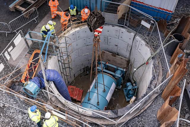 The giant Tunnel Boring Machine is lowered below ground at Meadow Lane Portadown. Picture: NI Water