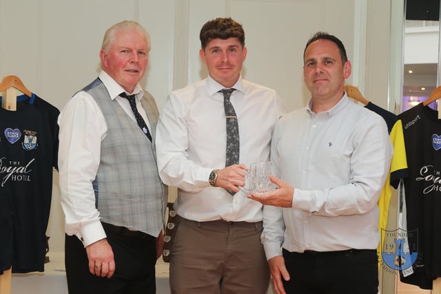 Receiving an award at the ceremony.
